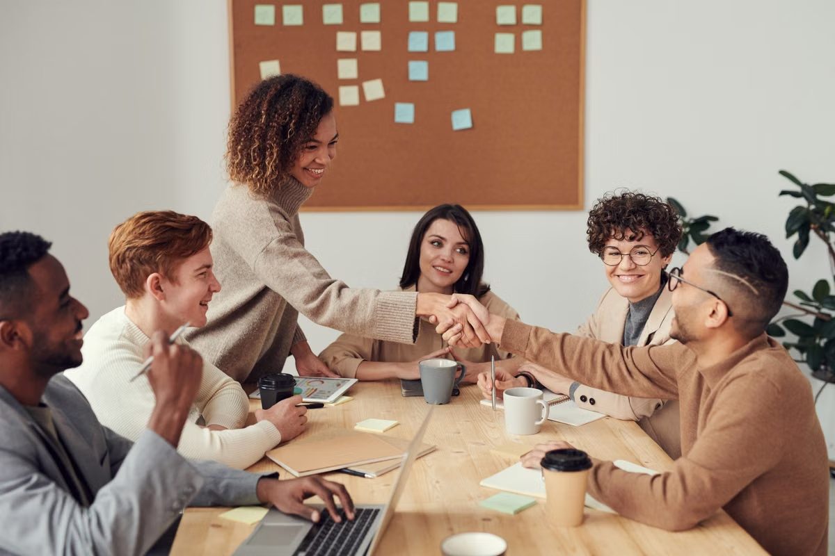 Stakeholders in discussion around a table