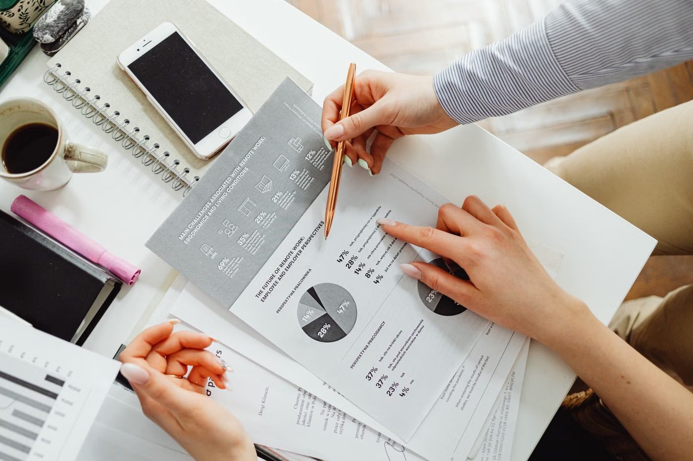 Financial report under review with a pen and notes